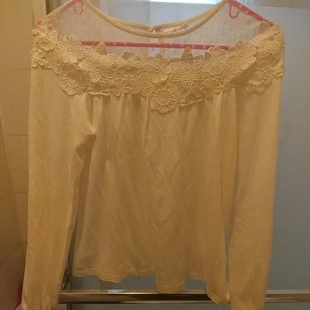Natural White Girl's long sleeve blouse.